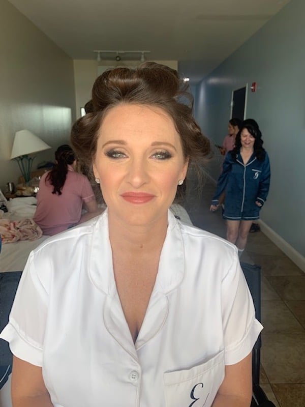 bride in robe getting her makeup done by Marissa Renee Artistry