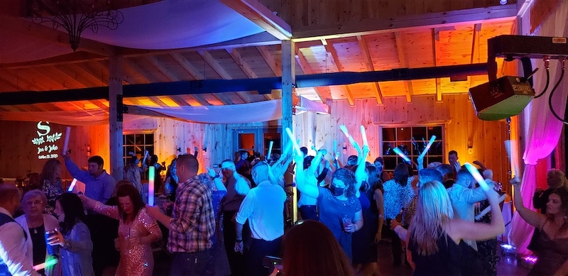 guests partying on the dance floor during wedding reception