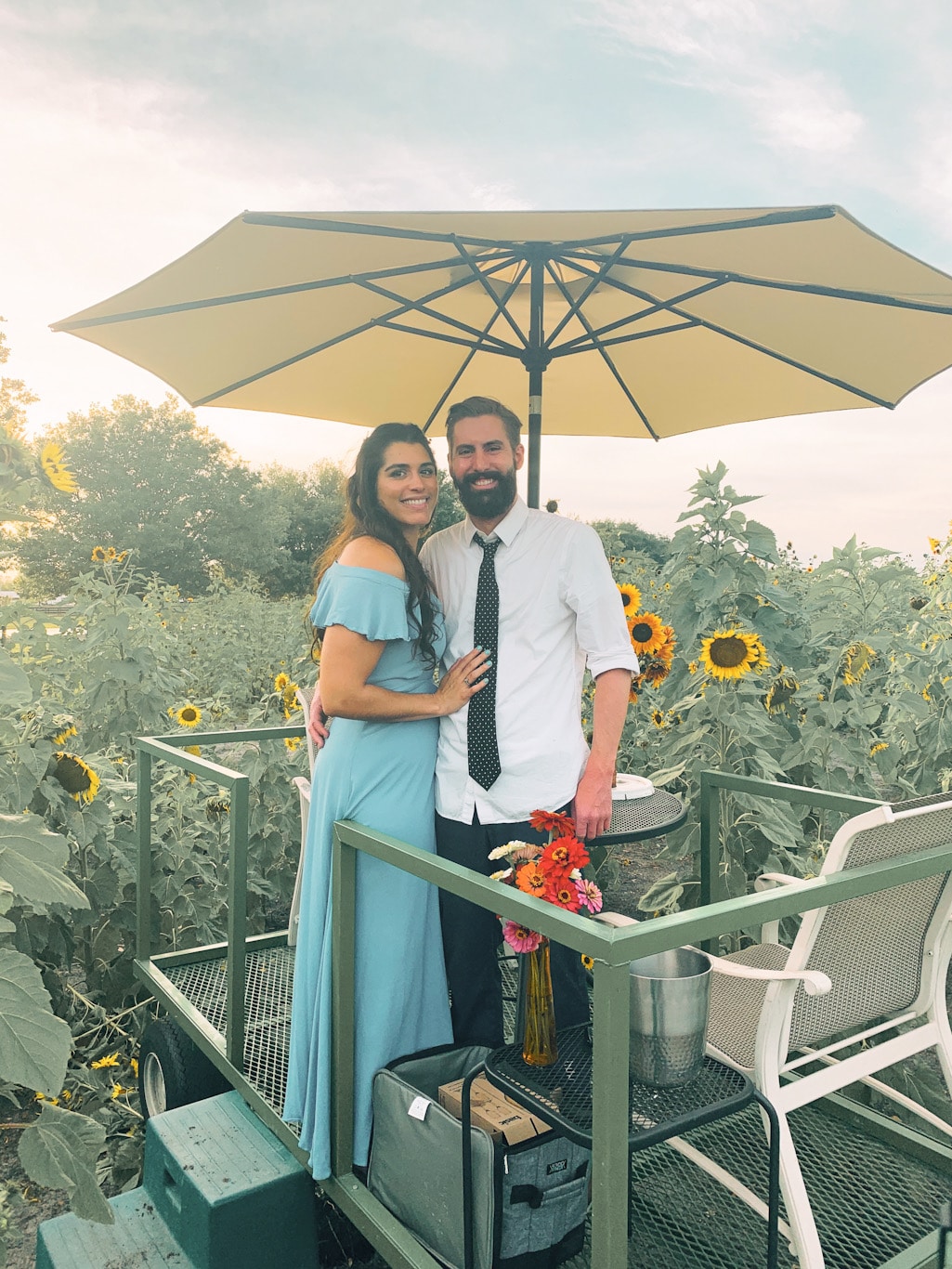 brand newly engaged couple in a sunflower field in lake county florida