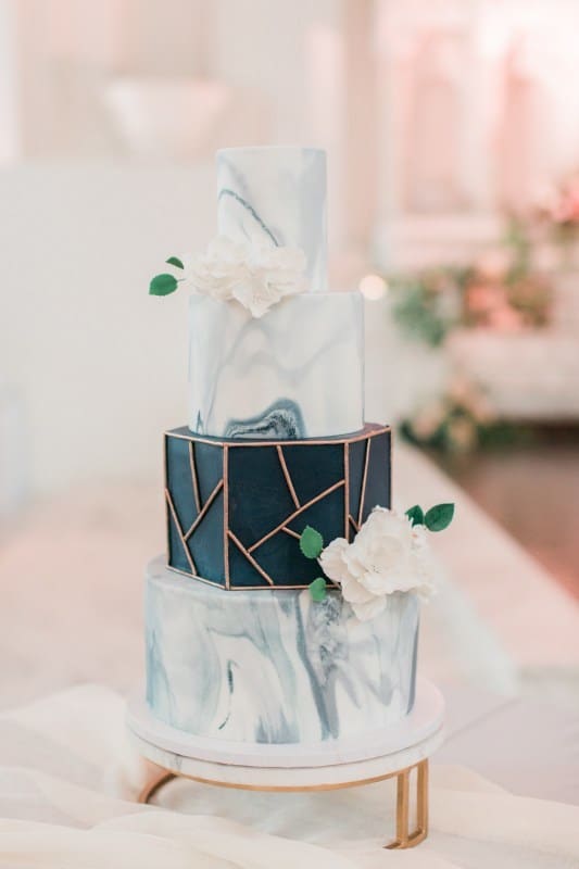 wedding cake decorated to look like it is covered with marble