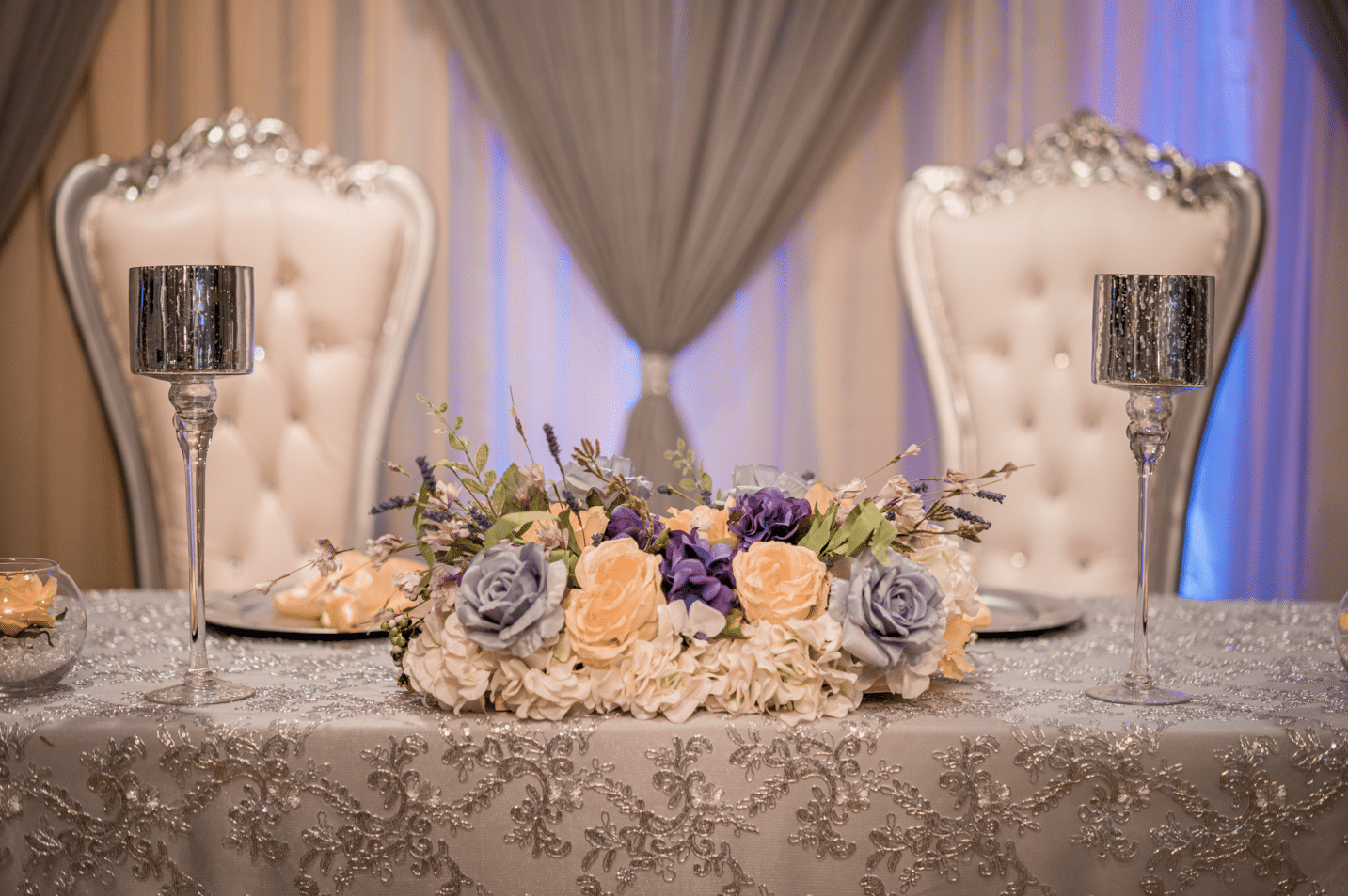 flowers placed on a sweetheart table for decoration