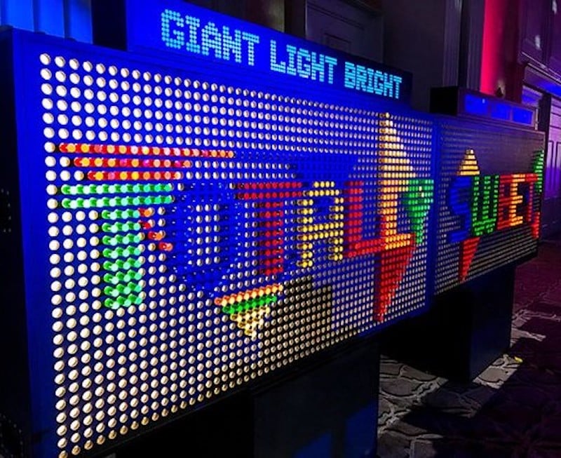 giant light bright with totally sweet spelled on it
