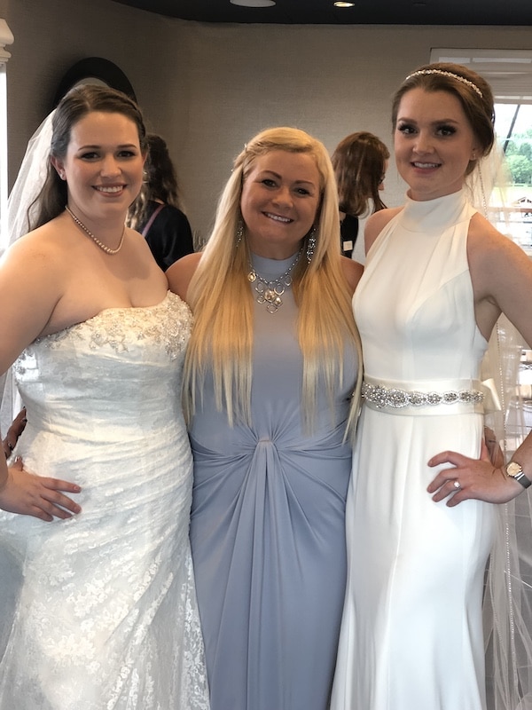 brides standing next to Hearts and Souls Event Management wedding planner