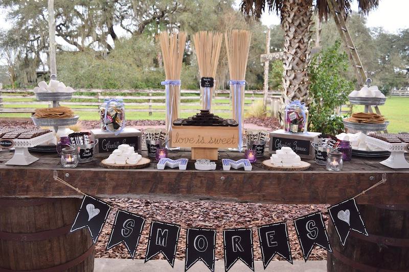 smores station set up at outdoor wedding by Florida Candy Buffets