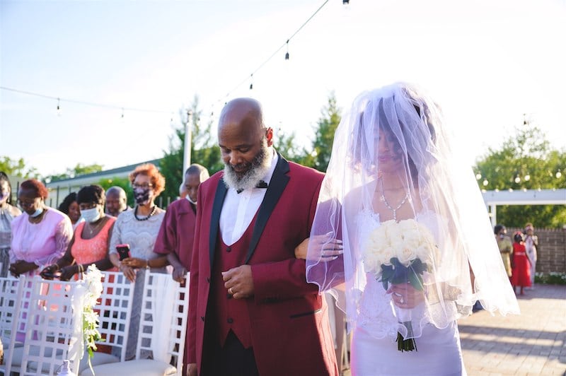 father of the bride escorting his daughter down the aisle, photo taken by Nativ Lens