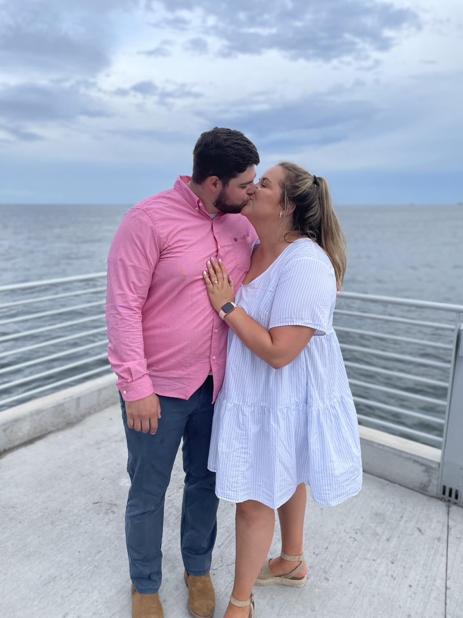 bride and groom to be kissing after their st. pete pier marriage proposal