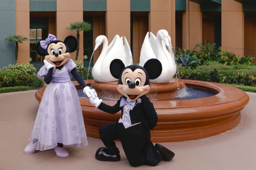 Mickey and Minnie Mouse in front of fountain at Walt Disney World Swan and Dolphin Resort
