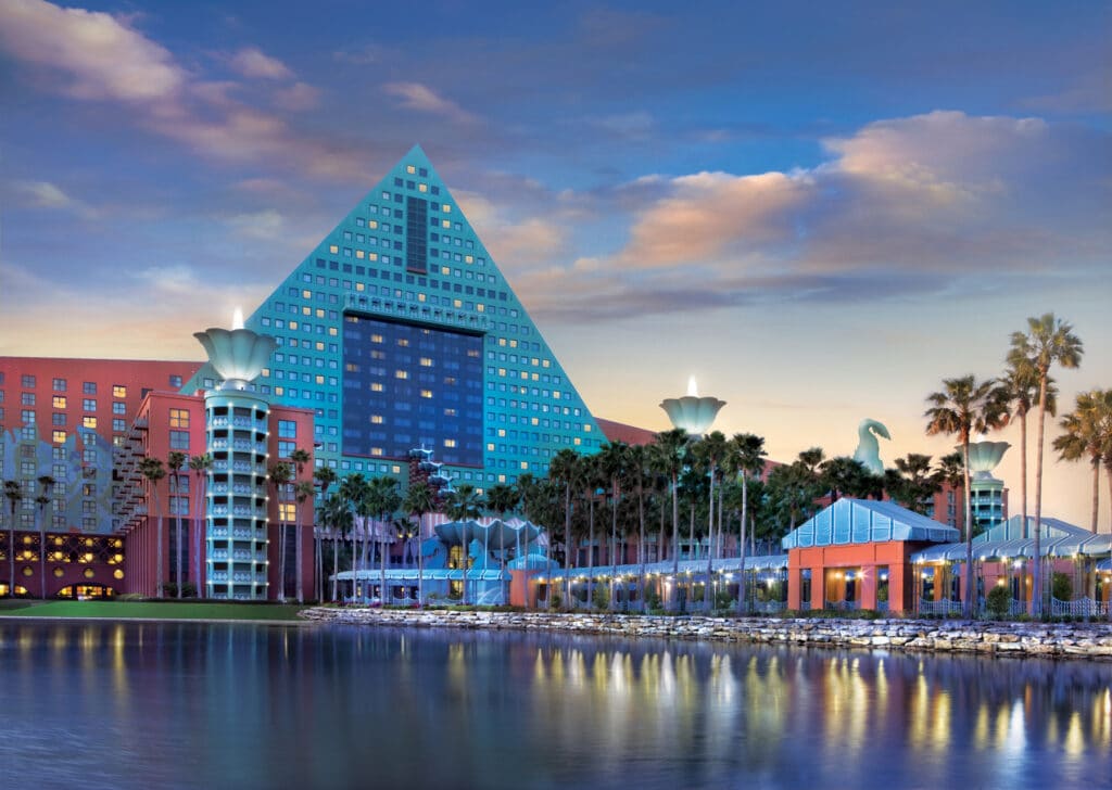 triangle shaped hotel at walt disney world with water in the foreground