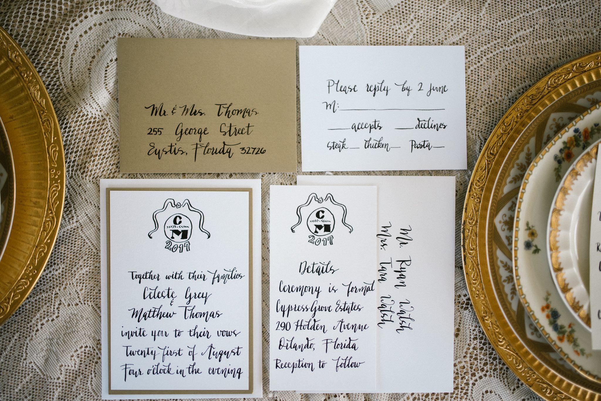 Black, gold and white wedding stationary and caligraphy