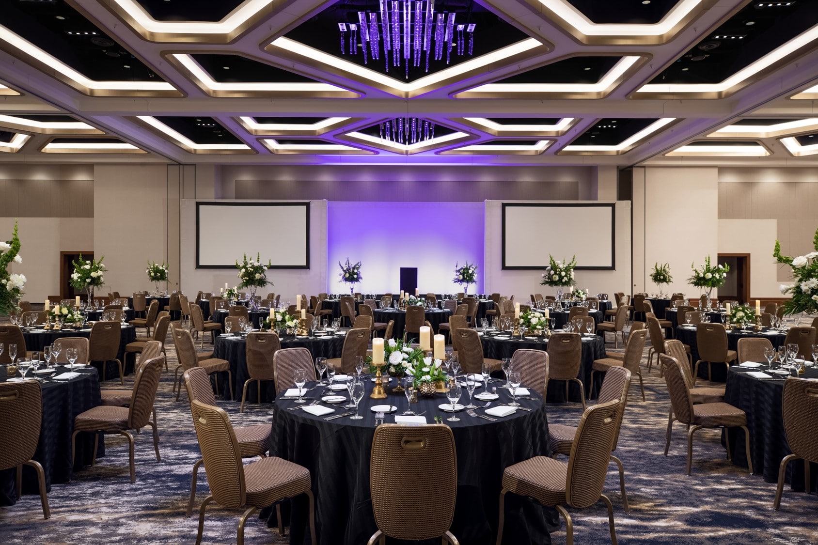 large ballroom set for wedding reception at Renaissance Orlando at SeaWorld