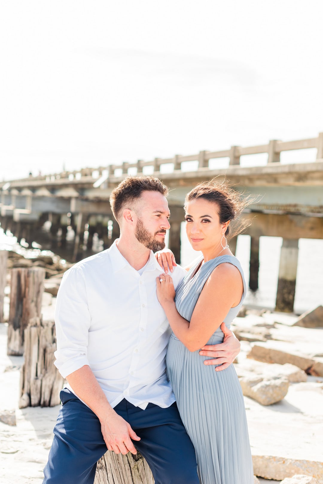 the guests dressed in blue to match the theme of the amelia island beach wedding inspiration shoot