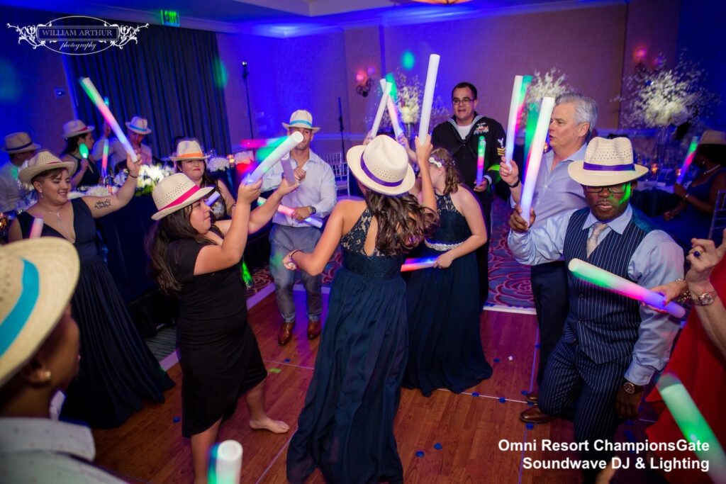 Light sabers on wedding dance floor with DJ from Soundwave Entertainment