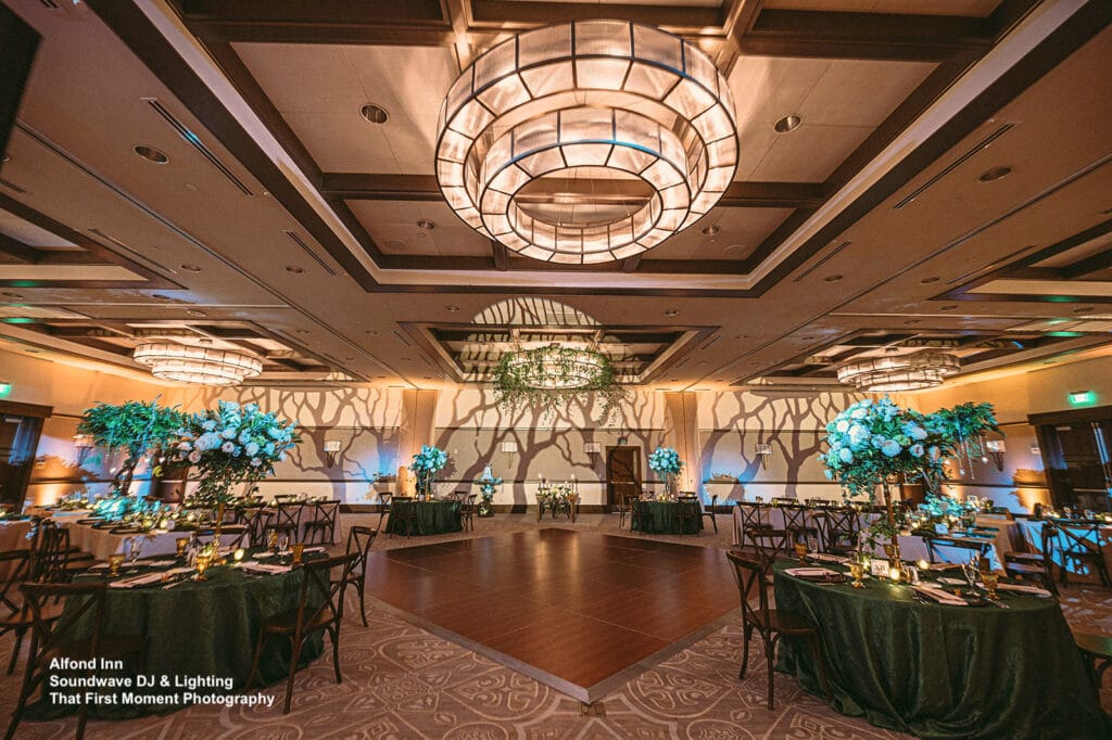 reception room with colored highlights on flowers by Soundwave Entertainment