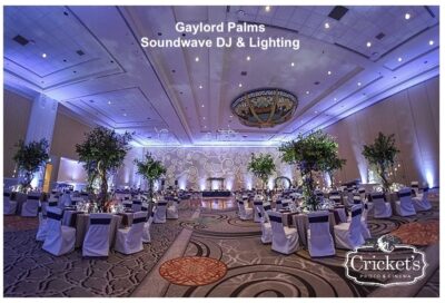 Wedding reception with tall greenery