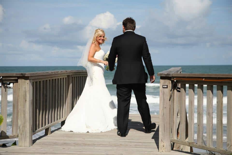 Bride and Groom on beach walkway