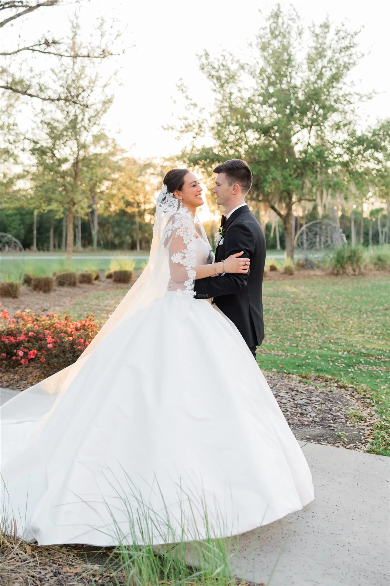 lt events ac06c2e5 - LT Events Newlywed couple posing outdoors at Four Seasons Resort Orlando during their Central Florida wedding.