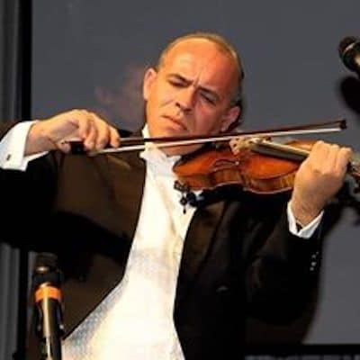 Male musician playing the violin.