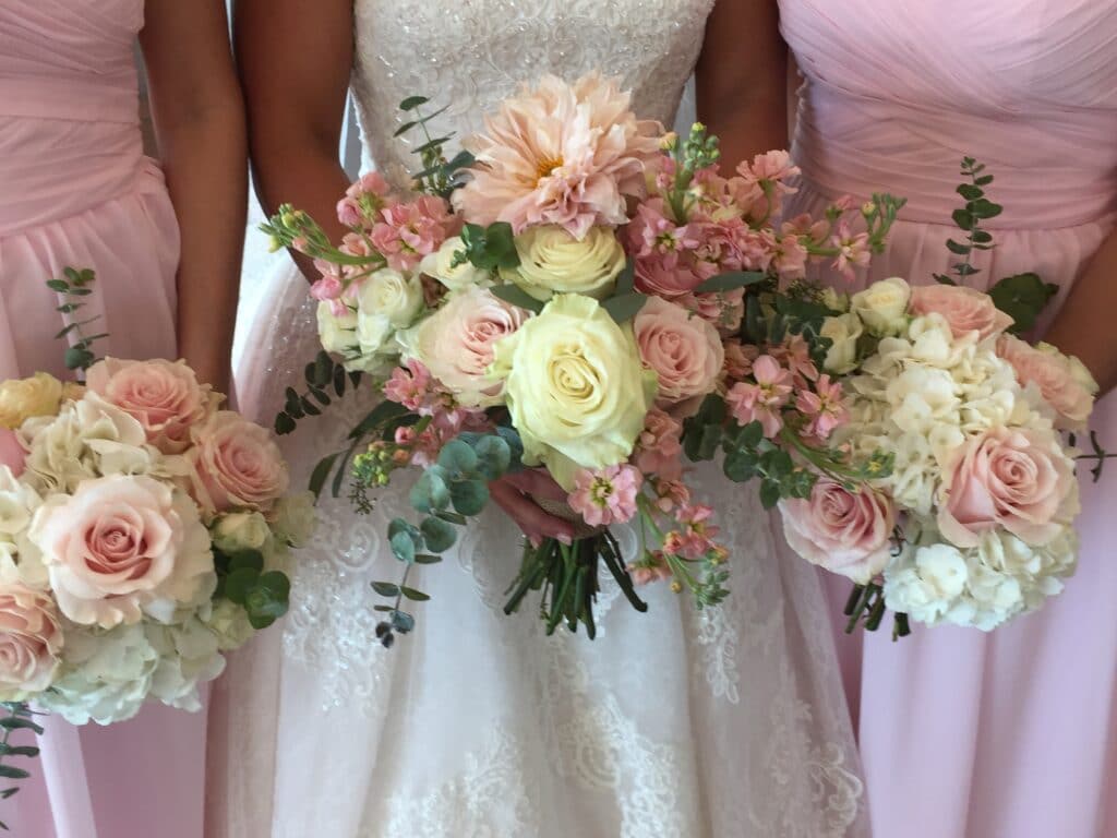 Bride with pink and white flowers