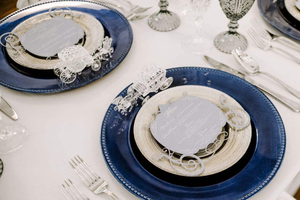 blue and white table with place cards by Shimmering Ceremony