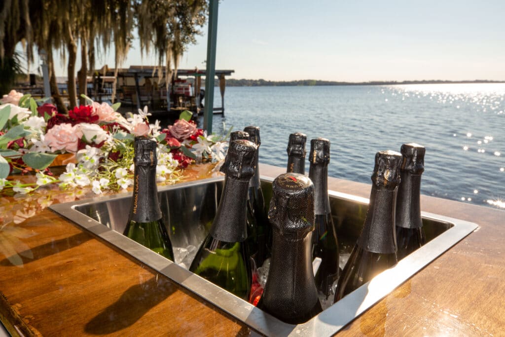 Beers on ice at a wedding on the lake by Tipsy Traveler Bar