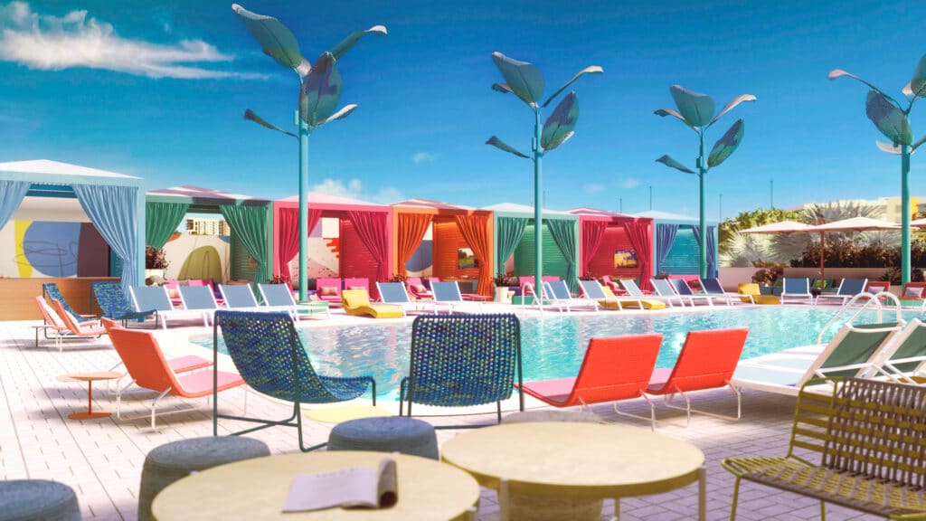 outdoor pool area with colorful walls and chairs at lake nona wave hotel and event venue