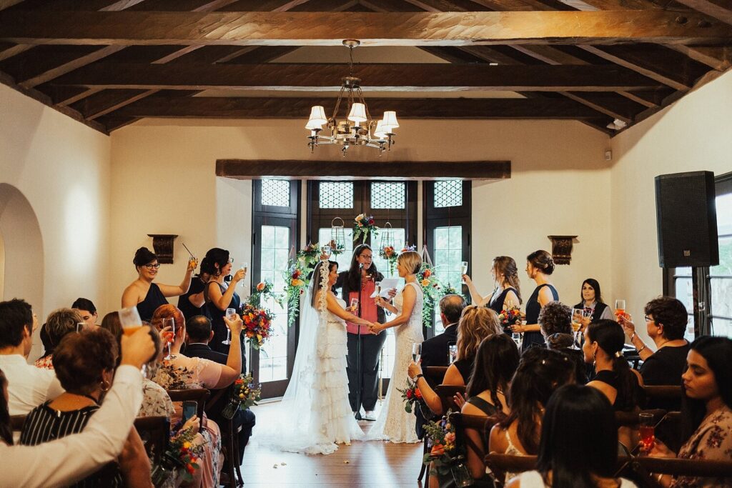 2 women exchanging their vows at their wedding