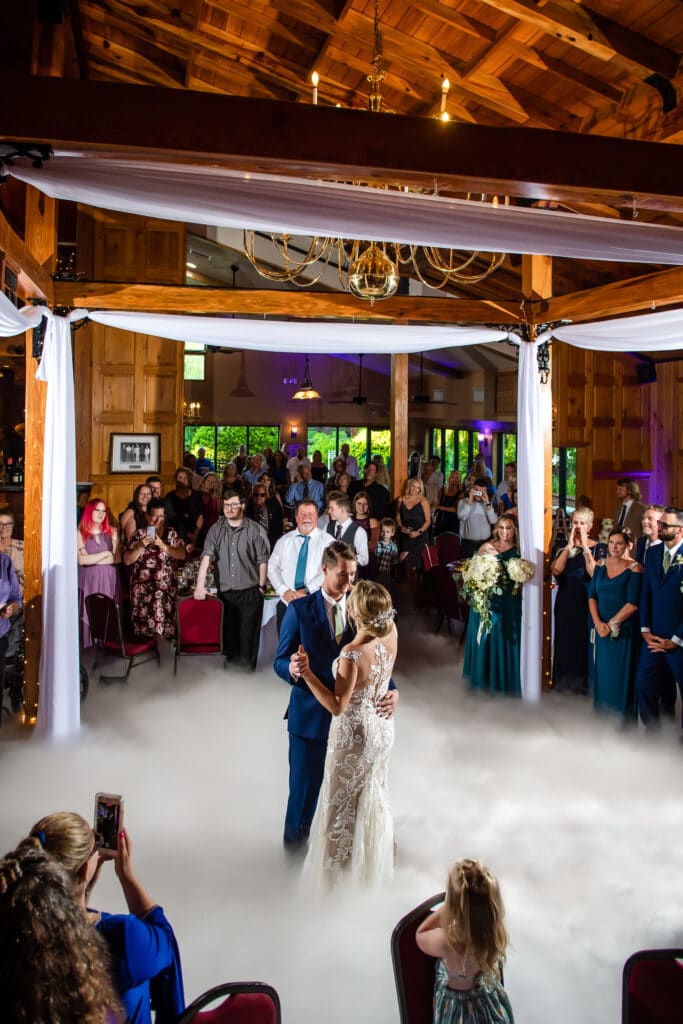 bride and groom dancing on a cloud photo by Jennifer Juniper Photography LLC