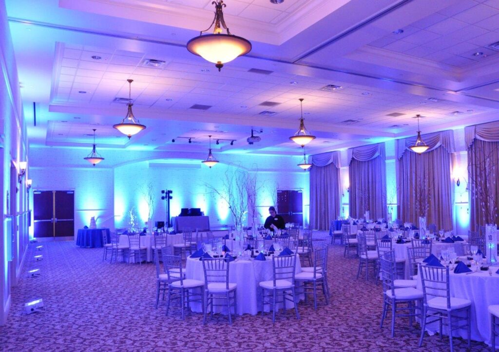 wedding reception with cool lavender lighting
