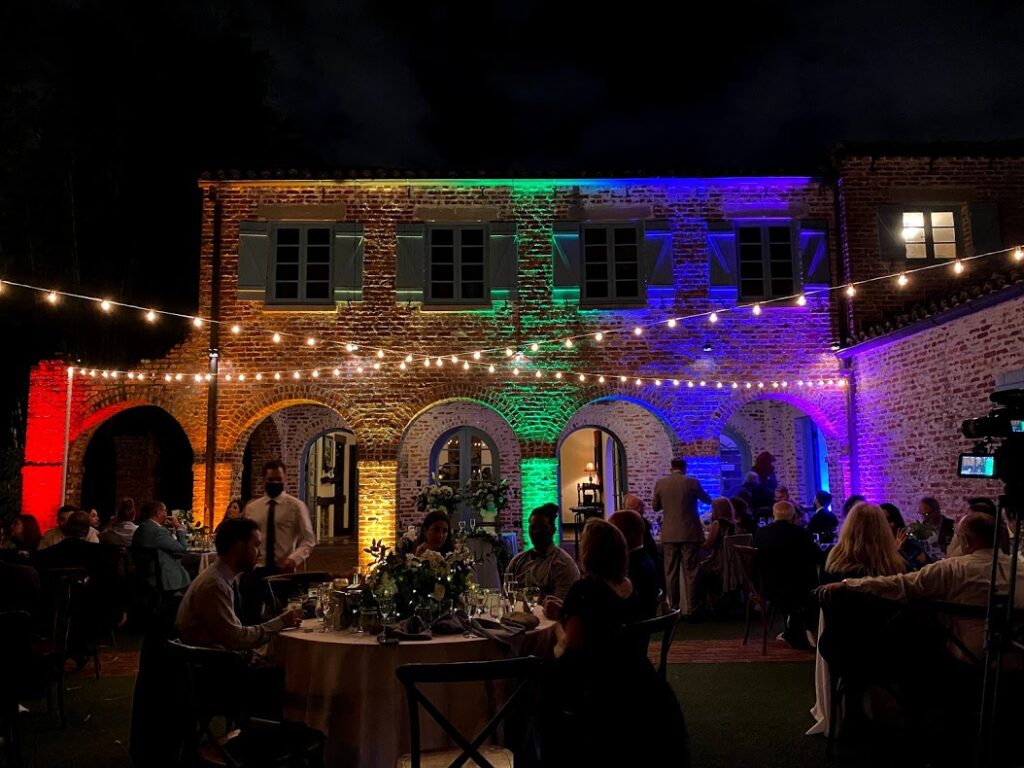 wedding reception with market lights and primary up lights.
