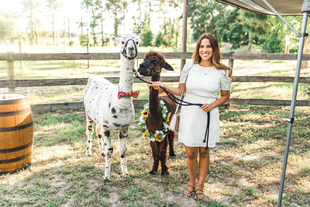 Beautiful Creatures Farm To You Revue woman with llama and alpaca