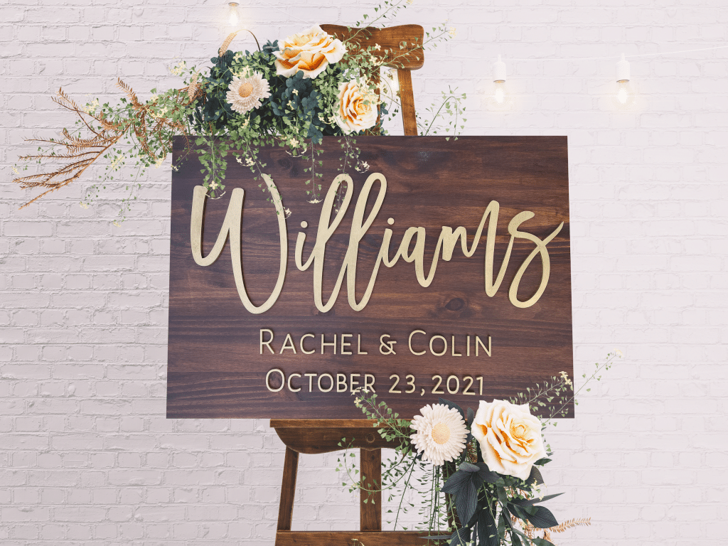 wooden wedding sign with pink flowers