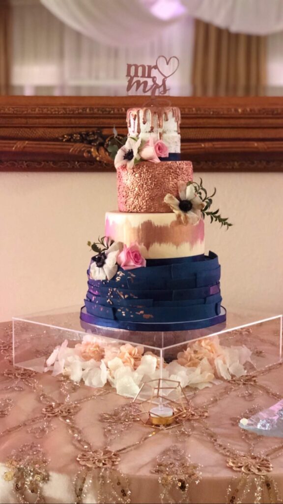 blue and rose gold tiered wedding cake by I heart cakes by Yari