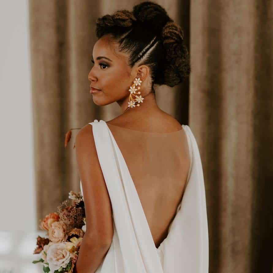 bride with low cut back of wedding dress