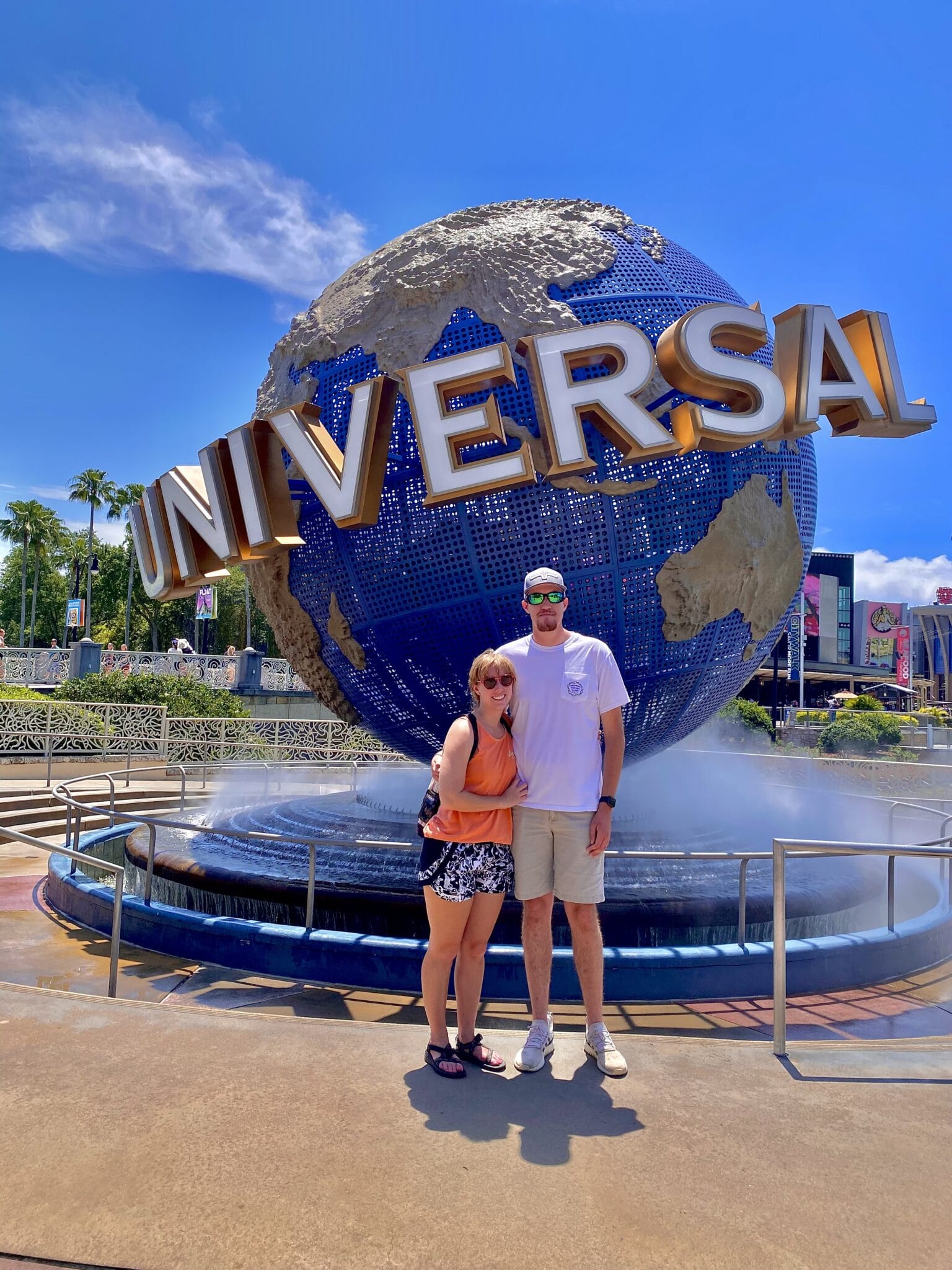 Couple in front of Universal sign in Orlando, FL