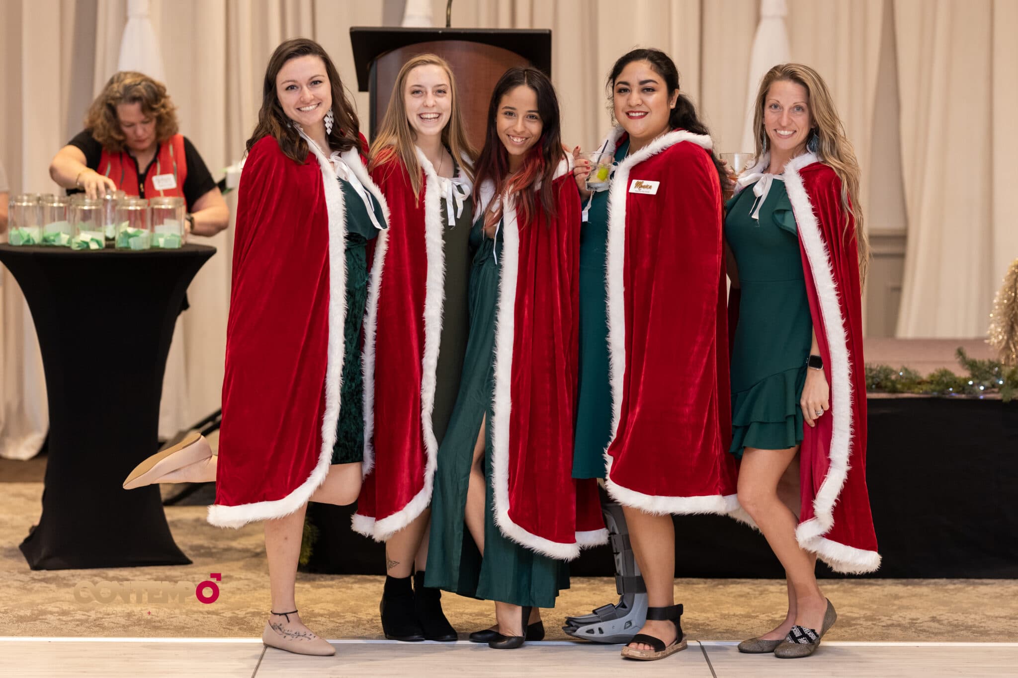 red capes for Seas the Day staff at Wedding Venue Map Blockbuster Holiday Party