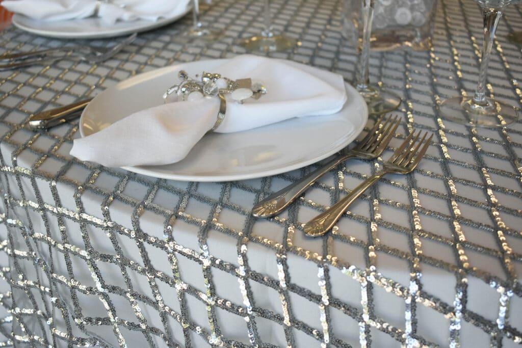 silver and white table setting by Connie Duglin Linen