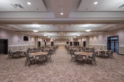 ballroom filled with tables at the Ocoee Lakeshore Center