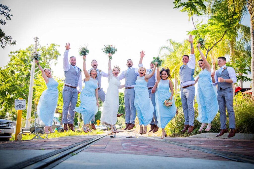 perfectly times photo of wedding party jumping in the air by Bold Beautiful and Beyond weddings