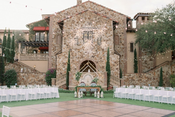 Beautiful brick building set up for a reception and a dance floor