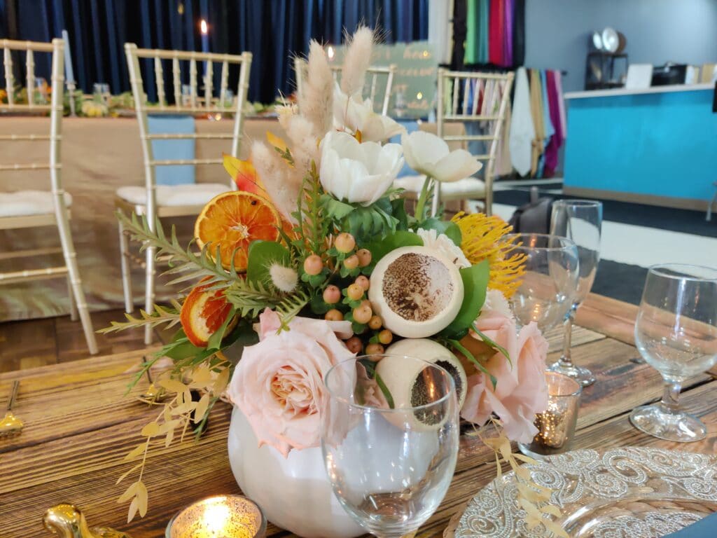 peonies and poppies center pieces by Stems in Bloom