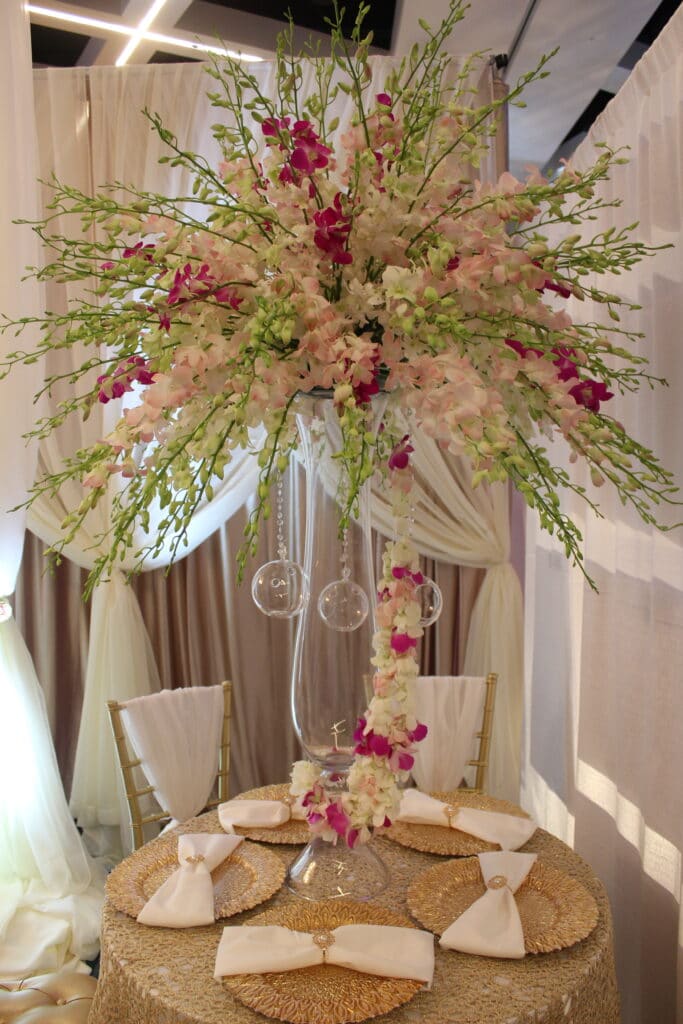 large tall spray of delicate flowers and greenery by Stems in Bloom