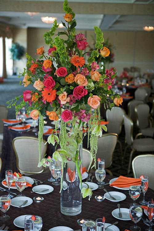 bright reception flowers by Leaf & Blossom Co