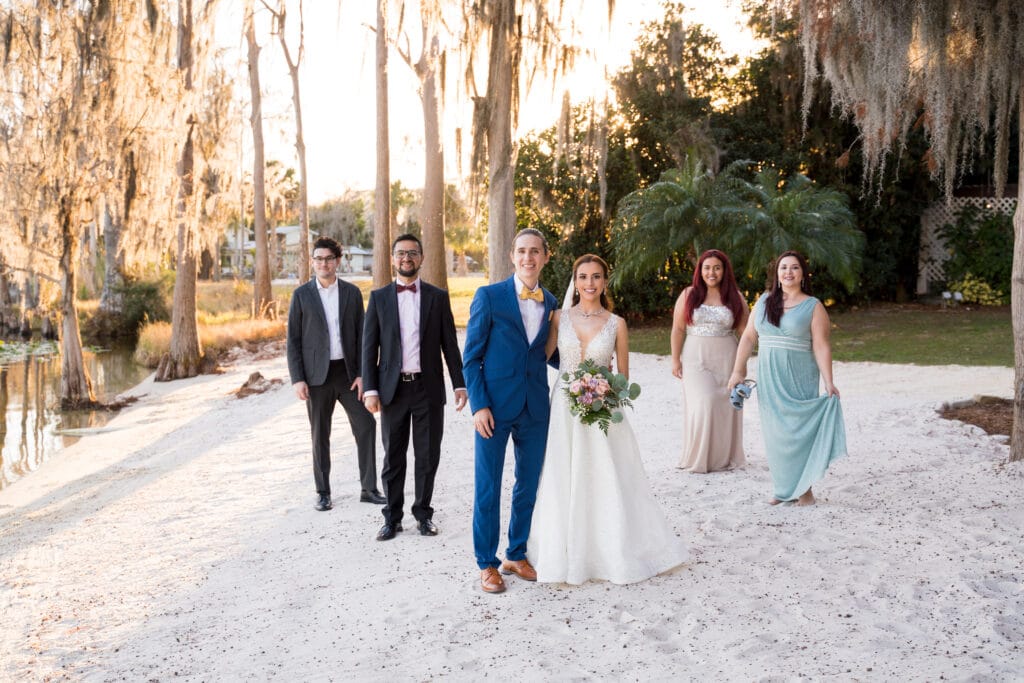 wedding party in shades of blue and grey on a swamp beach with details by 360 Emotions