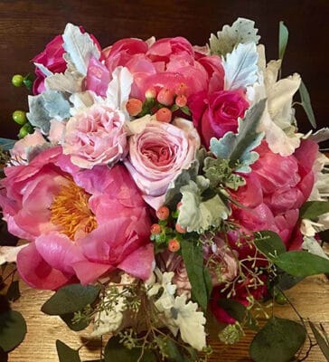 Pink seasonal peony centerpiece by Leaf & Blossom Co