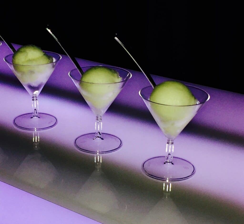 green and purple drink presentation in martini glasses by Frost 321