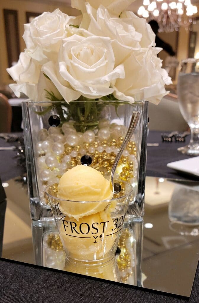 Vanilla frost dessert with white roses and pearl centerpiece by Frost 321
