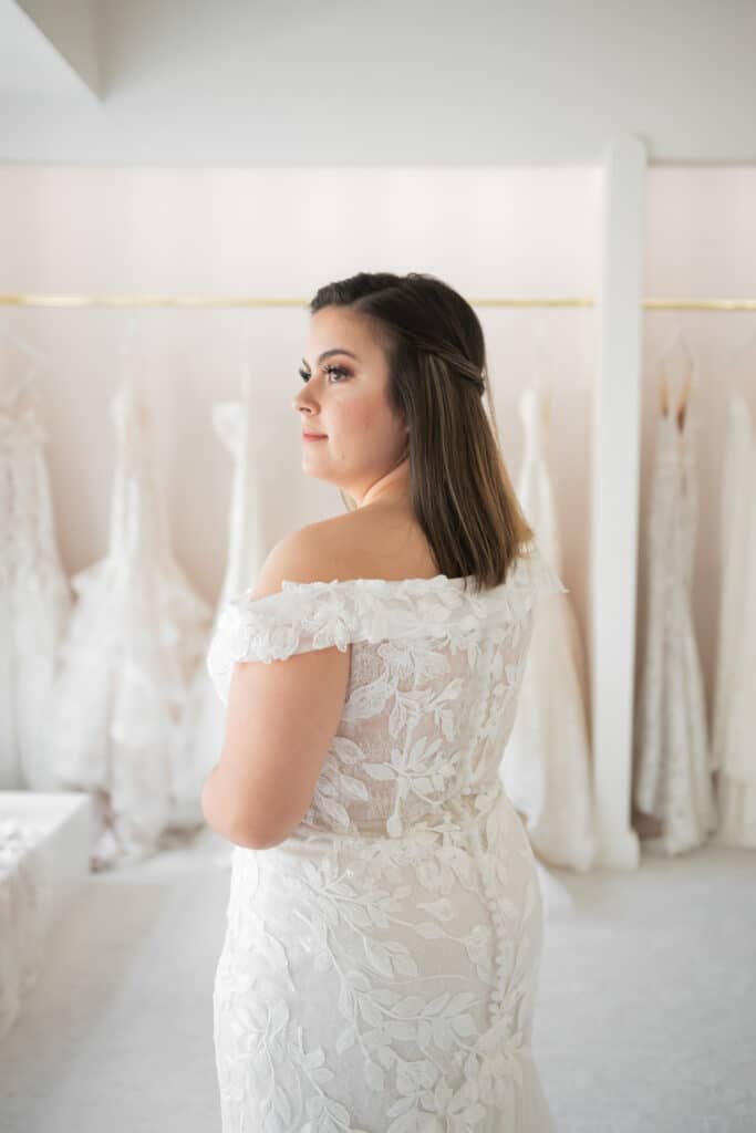 off the shoulder lace wedding gown at Enchanted Bride