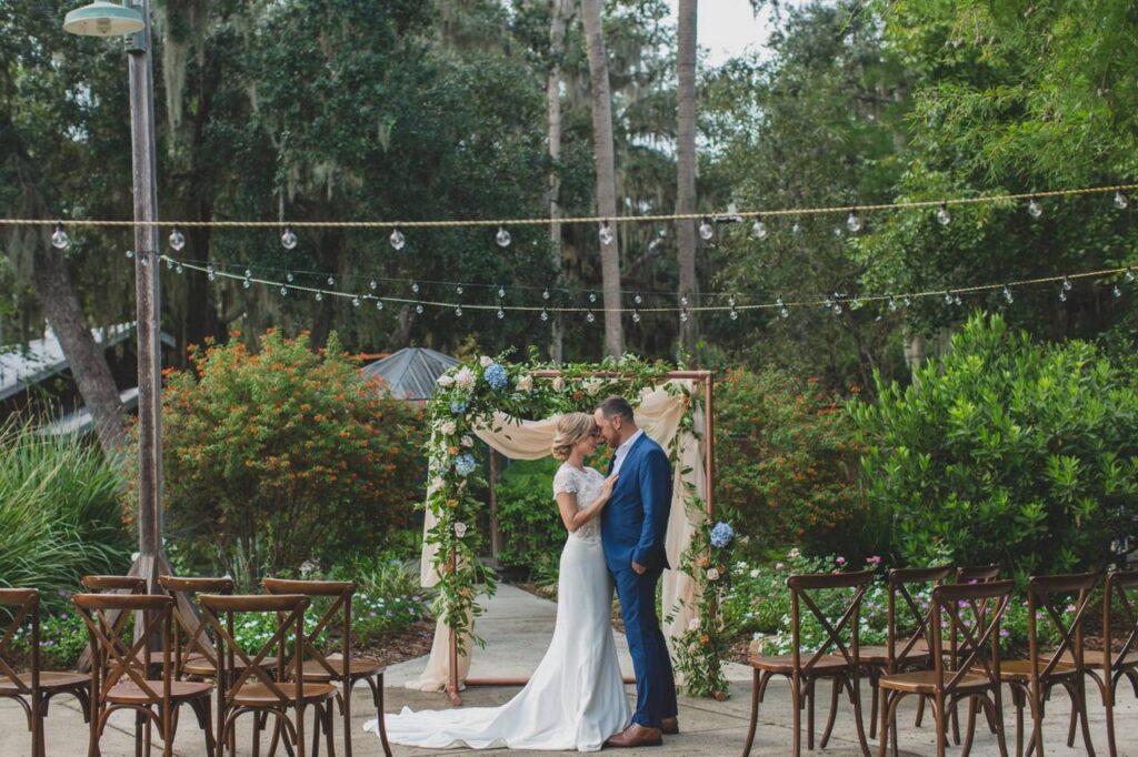 bride and groom having a moment at the Central Florida Zoo & Botanical Gardens