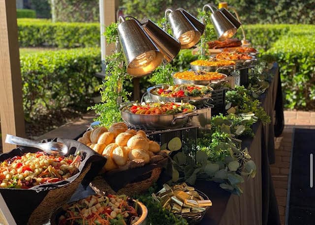 buffet presented in a garden by Corwin's Personal Chef and Catering Services