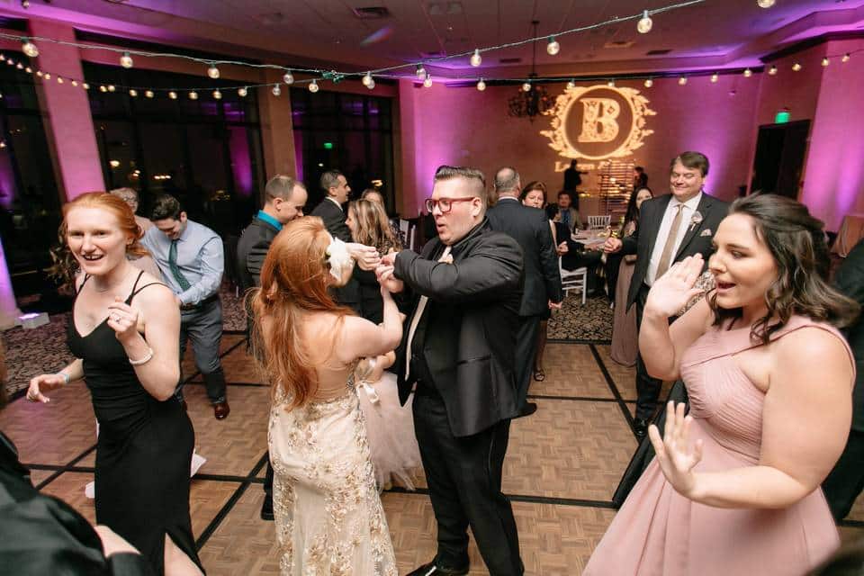 guests dancing at a wedding reception on cork dance floor by Meisner Productions